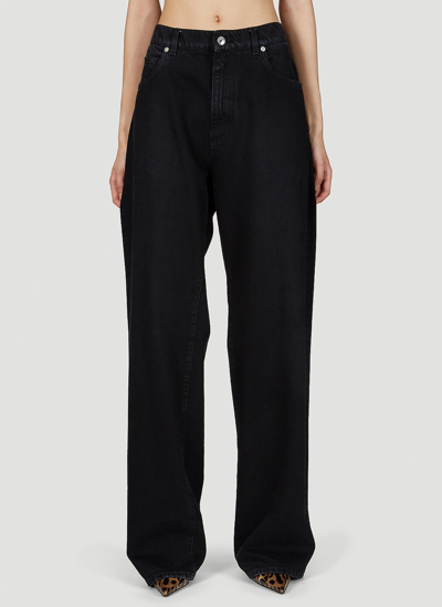 Dolce & Gabbana Flared Jeans With Ripped Details In Black