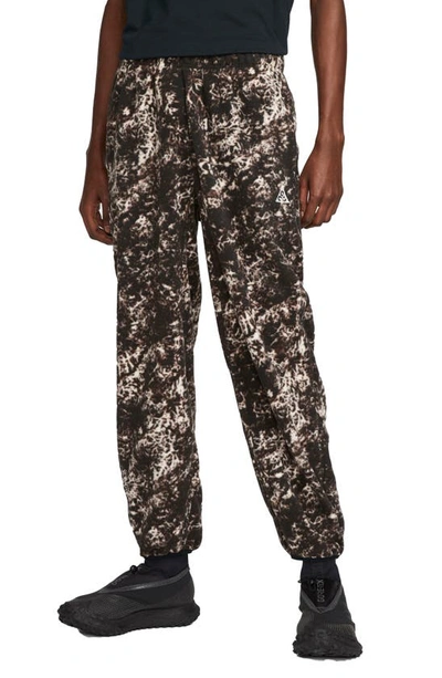 Nike Acg Wolf Tree Tapered Tie-dyed Polartec® Fleece Sweatpants In Brown