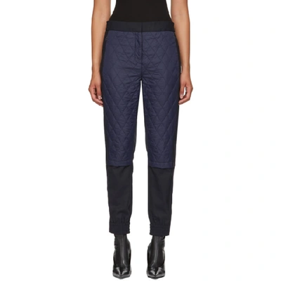 Tibi Mix Media Quilted Jogger Pants In Navy