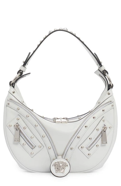 Versace Repeat Studded Leather Hobo Bag In Optical White-palladium