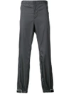 Prada Rubber Tag Track Pants In Grey