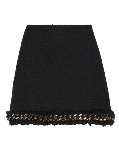 Versace Mini Skirts In Black