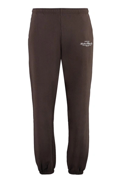 Sporty And Rich Logo-print Cotton Track Trousers In Brown
