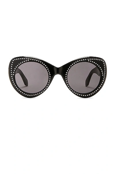 Alaïa Round Acetate Sunglasses In Black