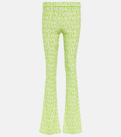 Versace Logo-print Flared Trousers In Green