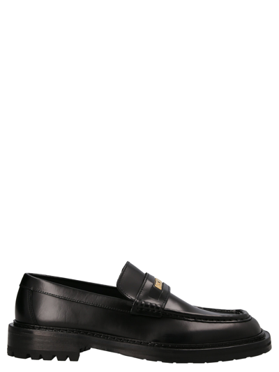 Moschino Abrasive Leather Loafers In Black