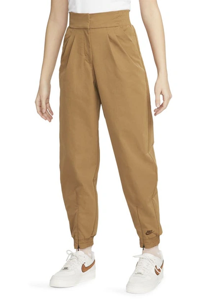 Nike Women's  Sportswear Dri-fit Tech Pack High-waisted Pants In Ale Brown/ Cacao Wow