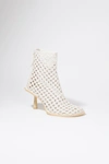 Simkhai Alex Heeled Boot In Ivory White