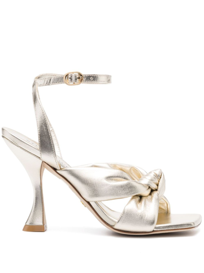Stuart Weitzman Playa Metallic Knot Ankle-strap Sandals In Gold