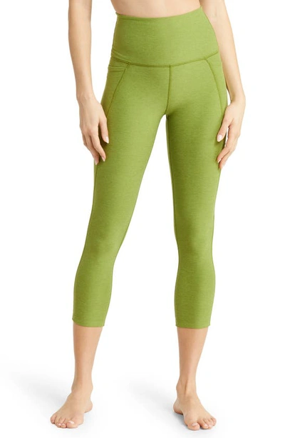 Beyond Yoga Space Dye Out Of Pocket Side Pocket High Waist Capri Leggings In Fern Green Heather
