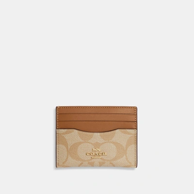 Coach Outlet Slim Id Card Case In Signature Canvas In Beige