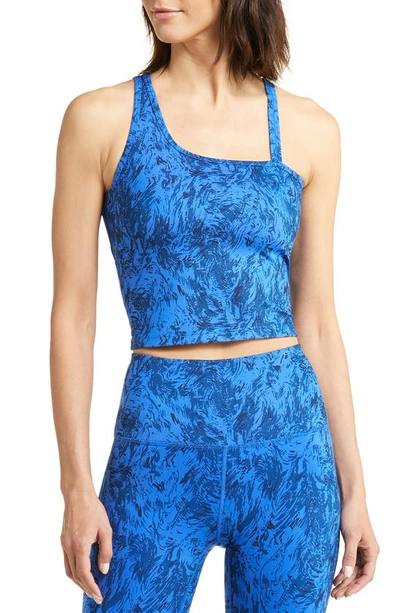 Zella Strength Crop Asymmetric Tank In Blue Mykonos Spindrift Print