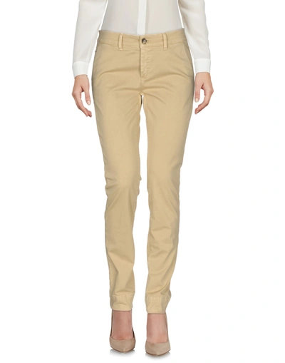 Care Label Trousers In Beige