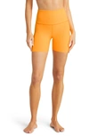 Beyond Yoga Keep Pace Space Dye Bike Shorts In Orange