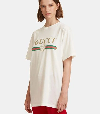Gucci Logo Print Faded Cotton T-shirt In Black