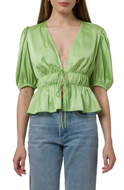 Wayf Tie Front Peplum Top In Green