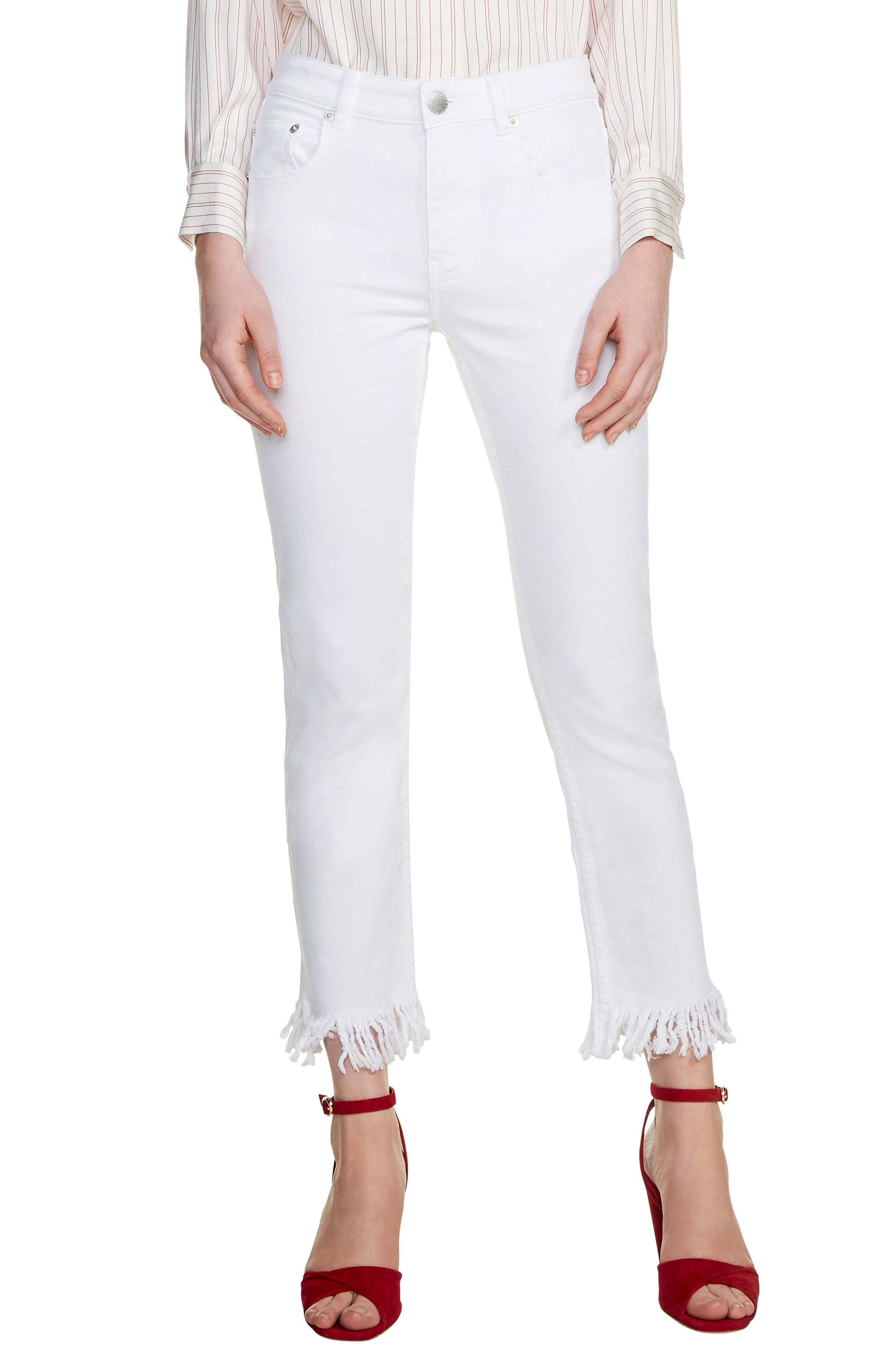white fringed jeans