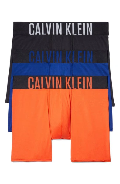 Calvin Klein Intense Power Boxer Briefs, Pack Of 3 In Fiesta, Black W/ Creamy White Logo, Midnight Blue