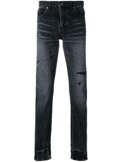 Saint Laurent Ripped Low-rise Skinny Jeans In Black