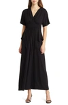Kiyonna Indie Surplice V-neck Maxi Dress In Black Noir