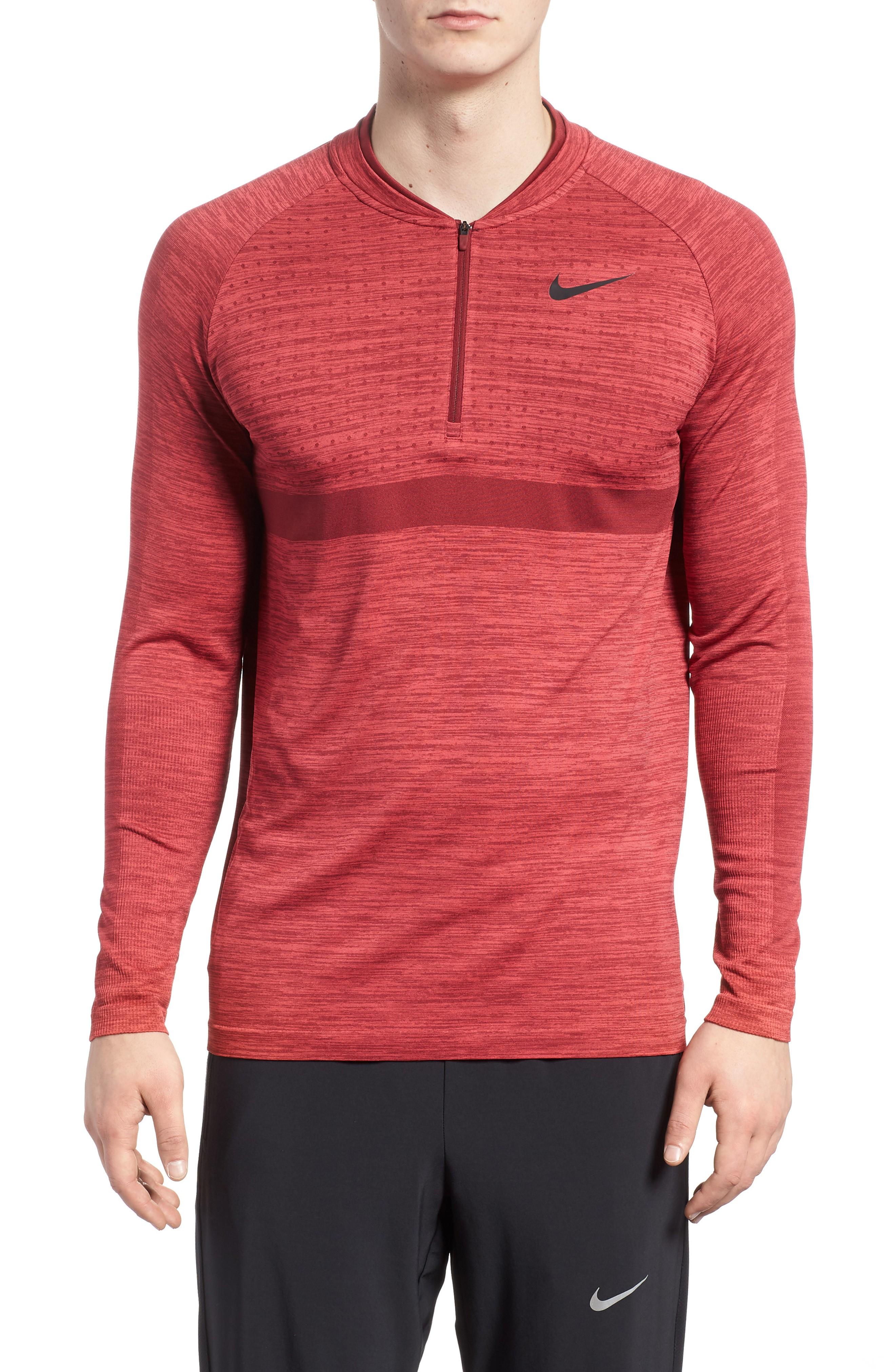 red nike half zip pullover