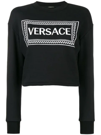 Versace Cropped Logo Printed Cotton Sweatshirt In Black