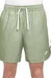 Nike Men's  Sportswear Sport Essentials Woven Lined Flow Shorts In Oil Green/white
