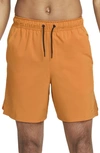 Nike Men's Unlimited Dri-fit 7" Unlined Versatile Shorts In Orange
