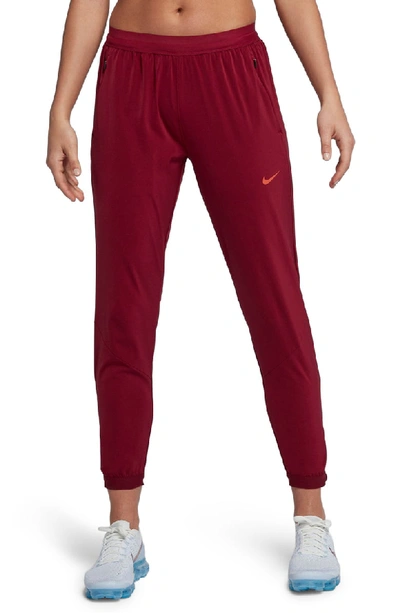 Nike Stadium Dri-fit Running Pants In Team Red/ Vintage Coral