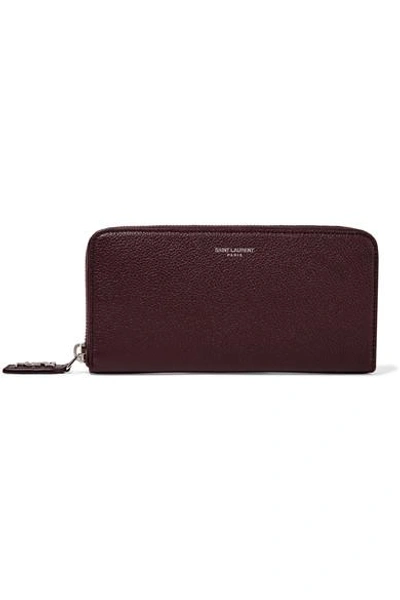 Saint Laurent Classic Rive Gauche Zip Around Wallet With Monogrammed Pull In Bordeaux Grained Leather In Purple