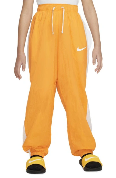 Nike Sportswear Big Kids' (girls') Woven Pants In Orange