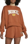 Nike Women's  Sportswear Phoenix Fleece City Edition Over-oversized Crewneck Sweatshirt In Orange