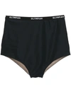 Olympiah Hot Pants Bikini Bottoms In Black