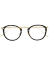 Cartier Round Frame Glasses In Brown