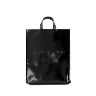 Acne Studios Logo Embossed Tote Bag In Black