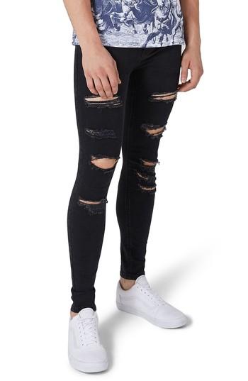 black ripped spray on jeans