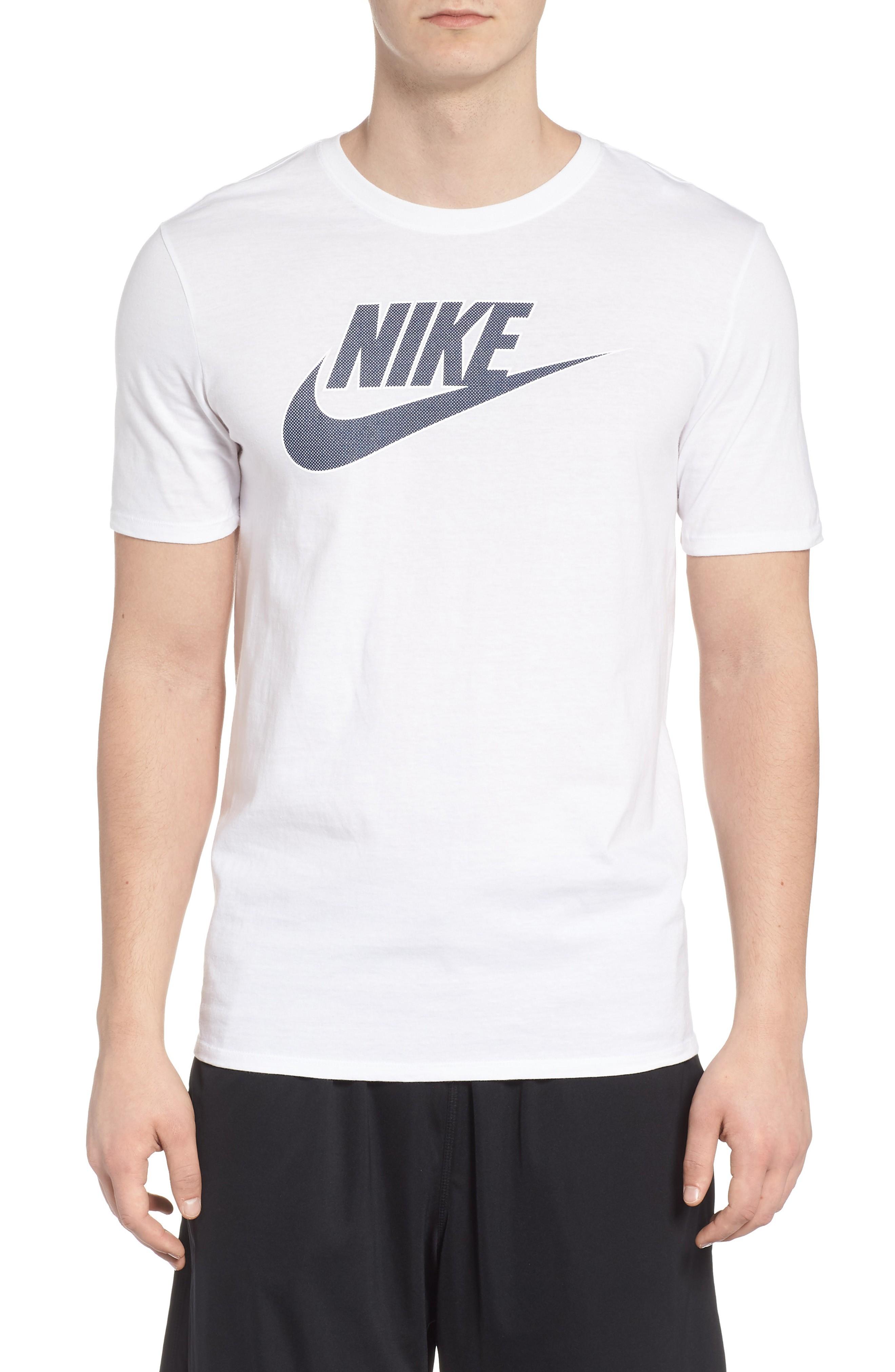 white and navy nike shirt