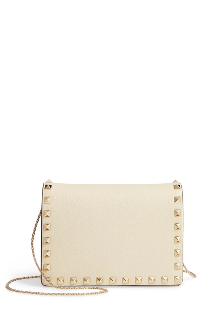 Valentino Garavani Rockstud Leather Pouch Wallet On A Chain In Ivory