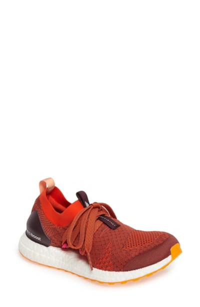 Adidas By Stella Mccartney Ultra Boost Knit Sneaker In Claret/ Orange