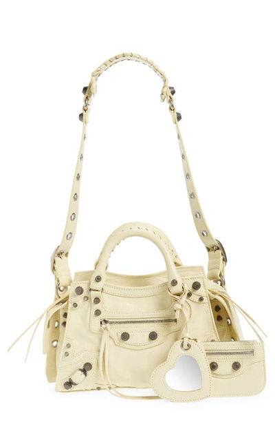 Balenciaga Extra Small Neo Cagole Leather Top Handle Bag In Champagne