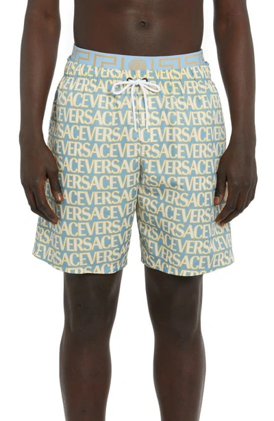 Versace Allover Logo Print Swim Board Shorts In Summer Sky Blue+
