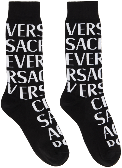 Versace Intarsia-knit Logo Socks In 2b020-black+white
