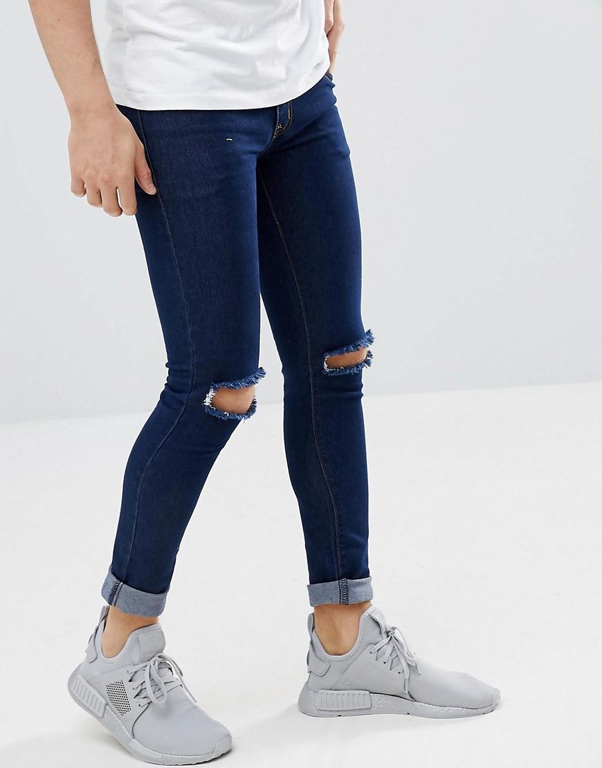 Criminal Damage Super Skinny Jeans In Indigo Ripped - Navy | ModeSens