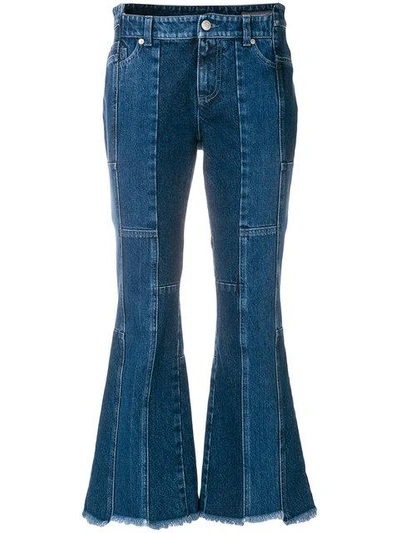 Alexander Mcqueen Asymmetric Flared Cropped Jeans In Blue