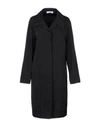 Jil Sander Overcoats In Black