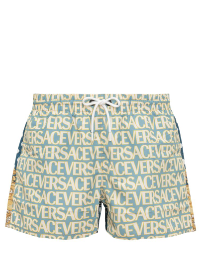 Versace Logo Print Swim Shorts In Light Blue+ivory