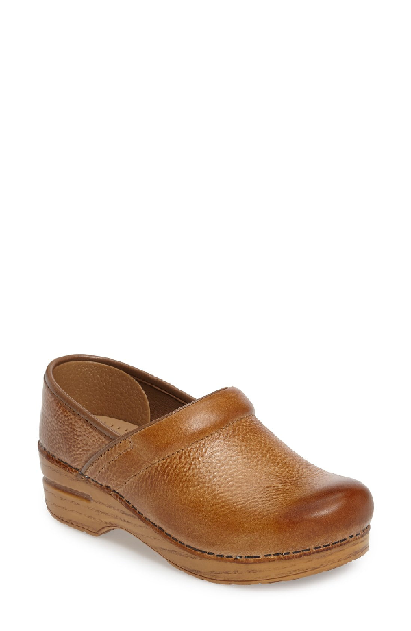 dansko honey distressed clogs