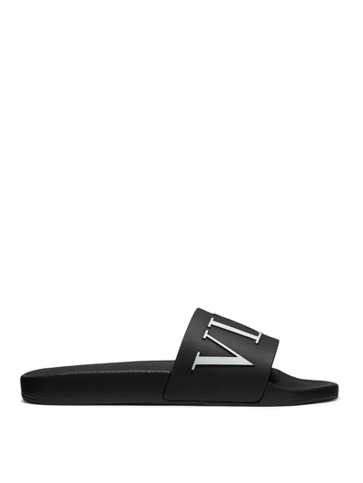 Valentino Garavani Luxury Shoes For Women   Valentino Vltn Flip Flops In Black Rubber