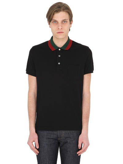 black gucci polo with red and green collar