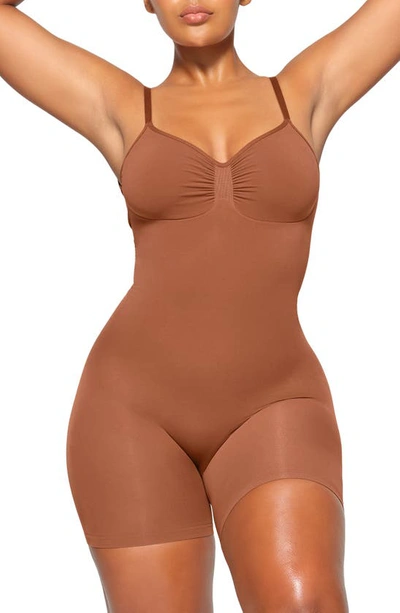 Skims Seamless Sculpt Low Back Mid Thigh Bodysuit In Bronze
